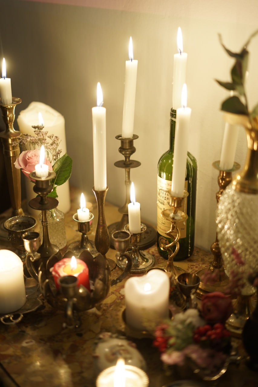 elegant wine bottles arranged on dark table Warsaw venue